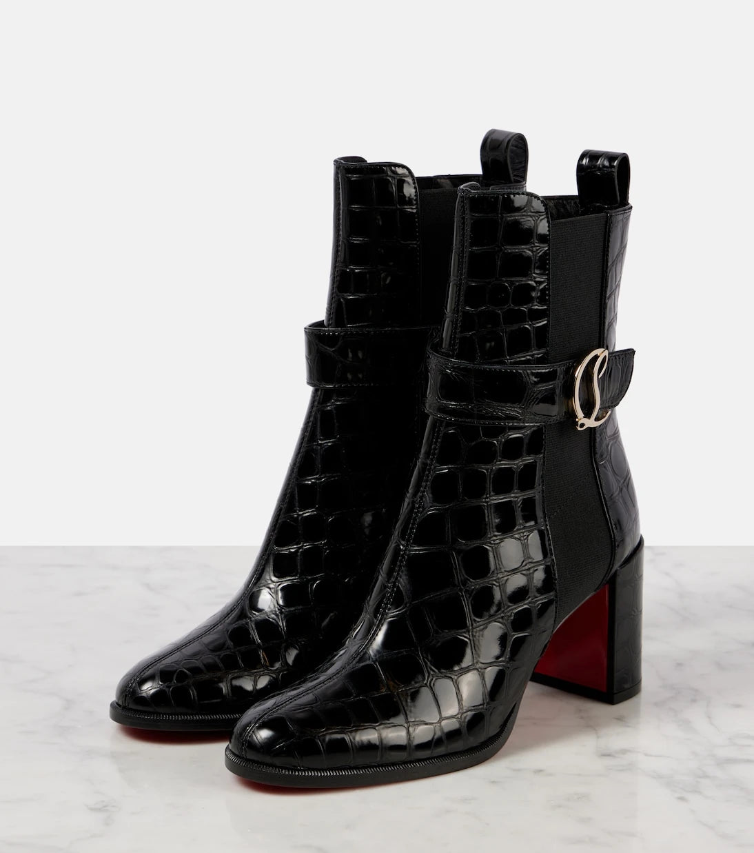 Christian Louboutin - حذاء الكاحل CL الجلدي بنمط جلد التمساح