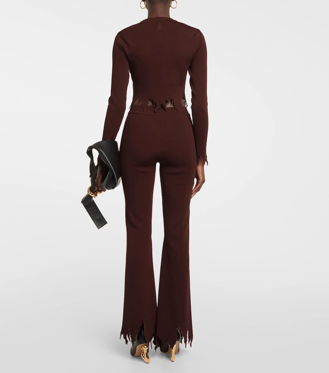 JW Anderson - Ribbed-knit distressed slim pants