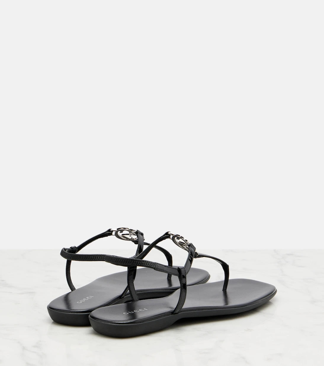 Gucci - Interlocking G patent leather thong sandals