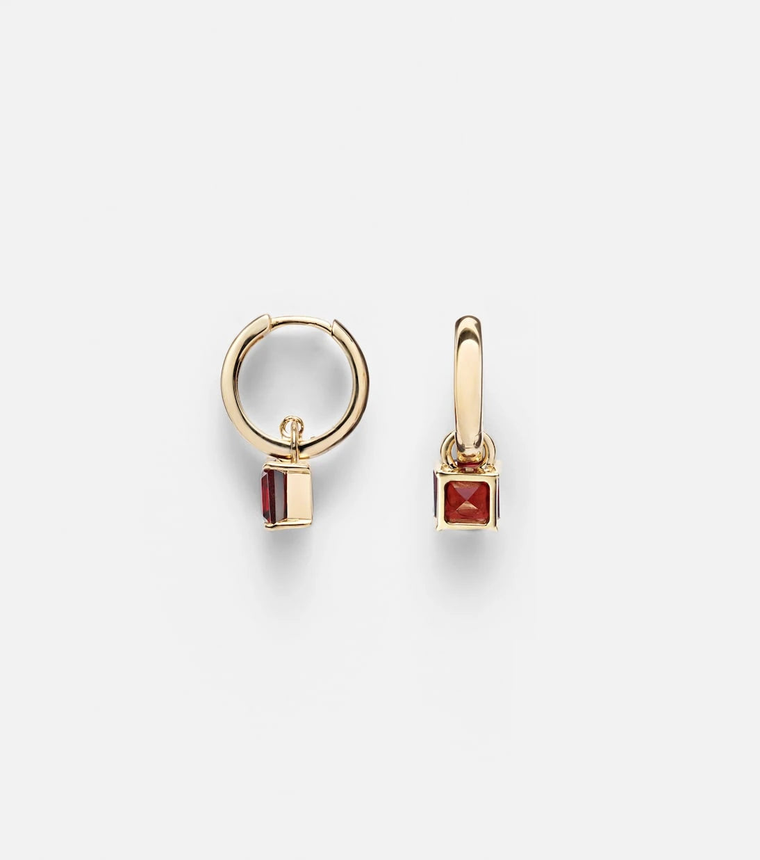 Stone and Strand - 10kt gold earrings with garnets
