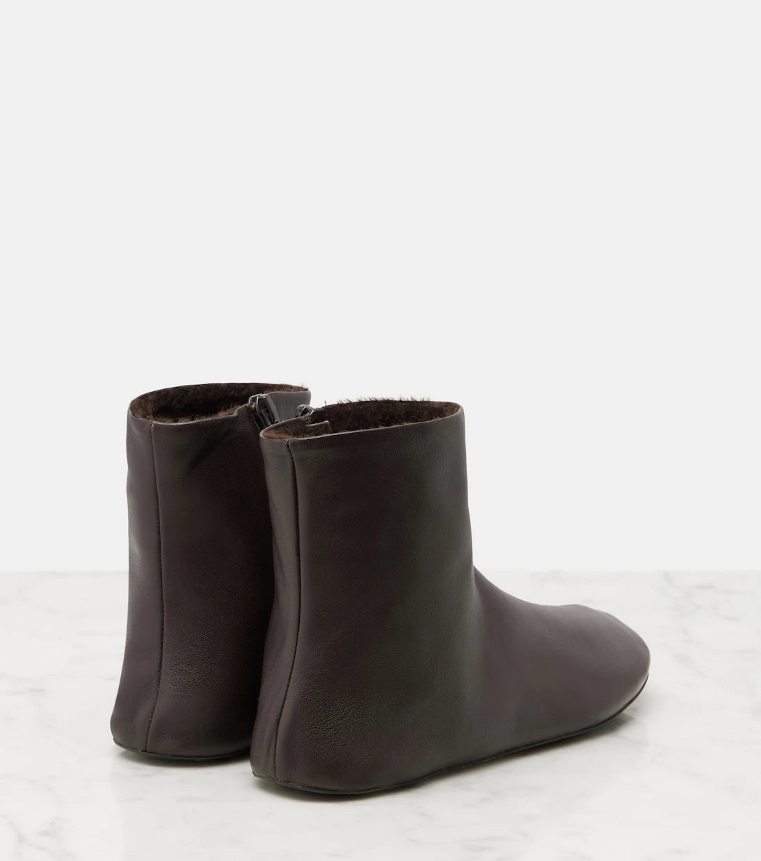 The Row - Stella shearling-lined leather ankle boots