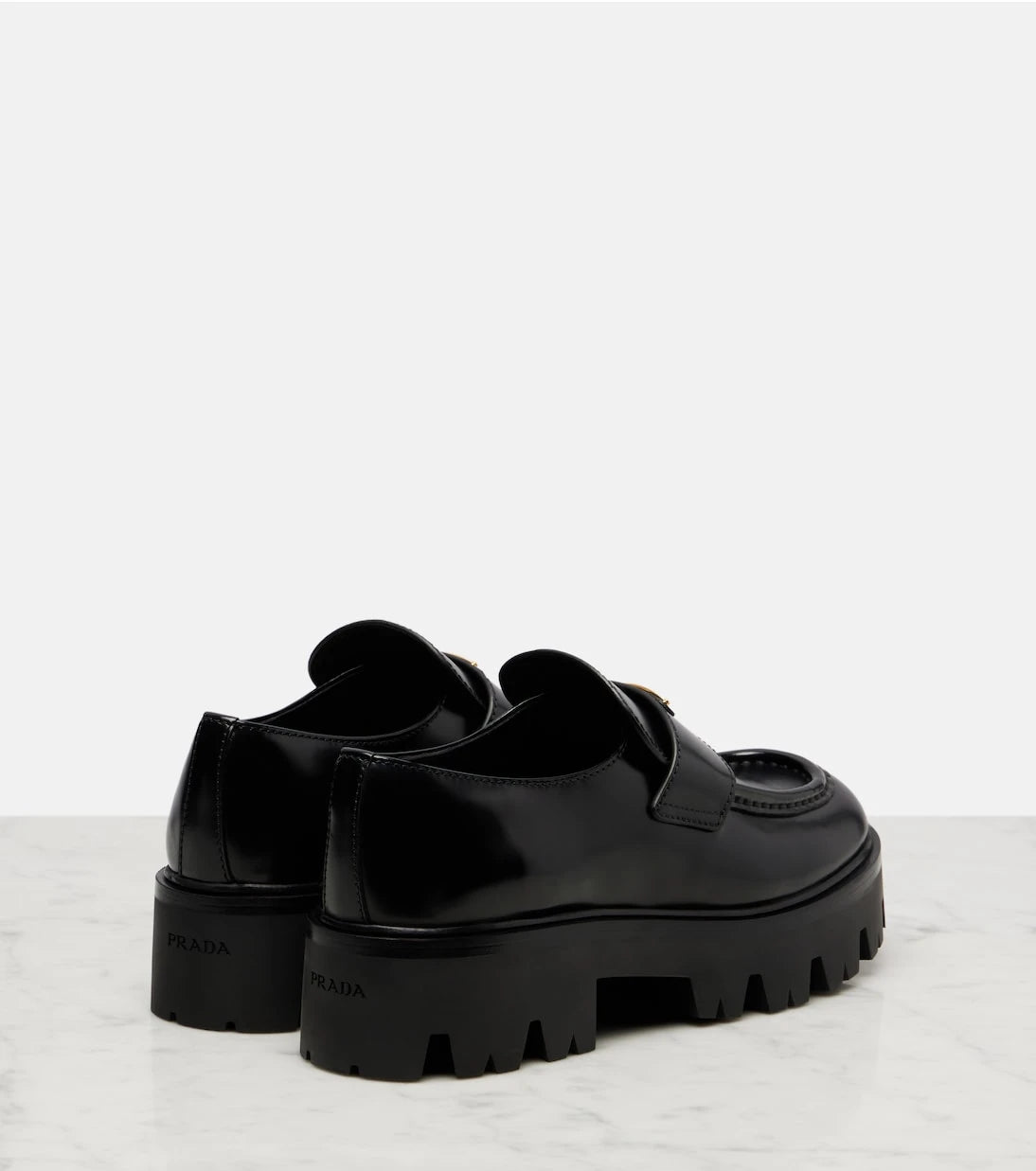 Prada - Logo leather platform loafers