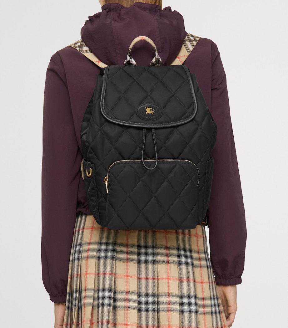 Black Quilted Horseshoe Backpack