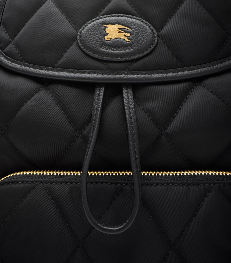 Black Quilted Horseshoe Backpack