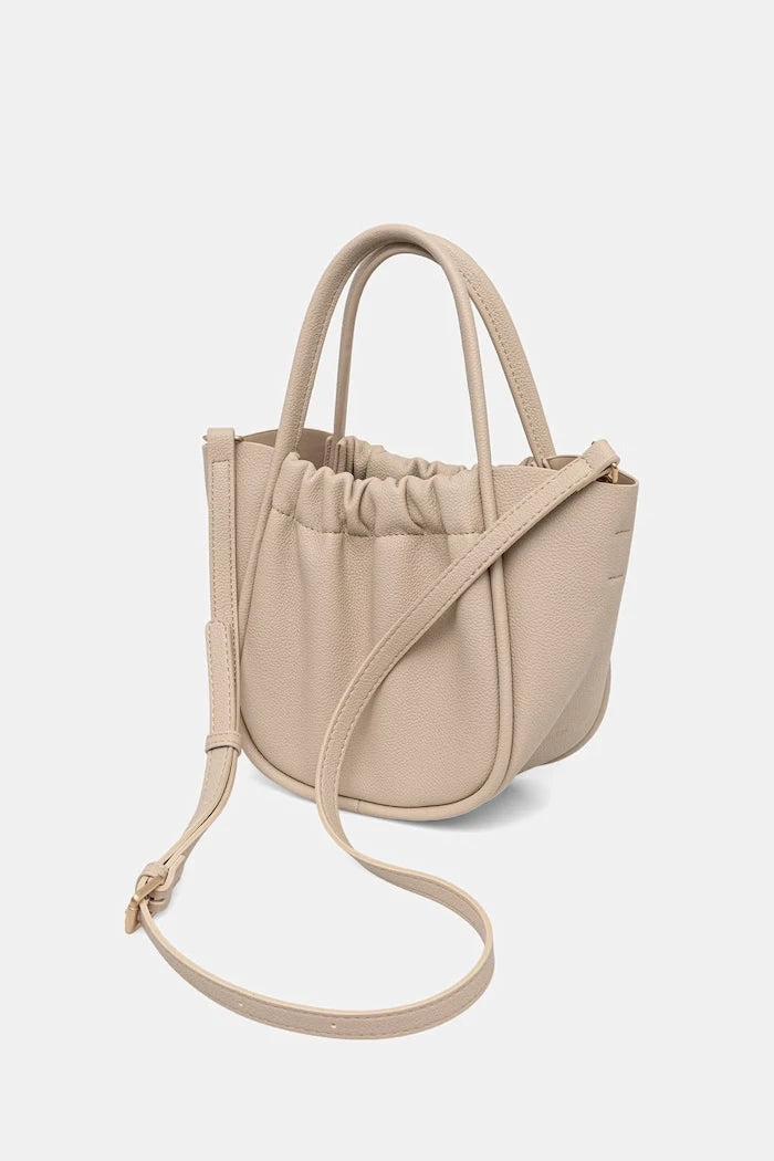 Medicine suni deri crossbody kadın çantası