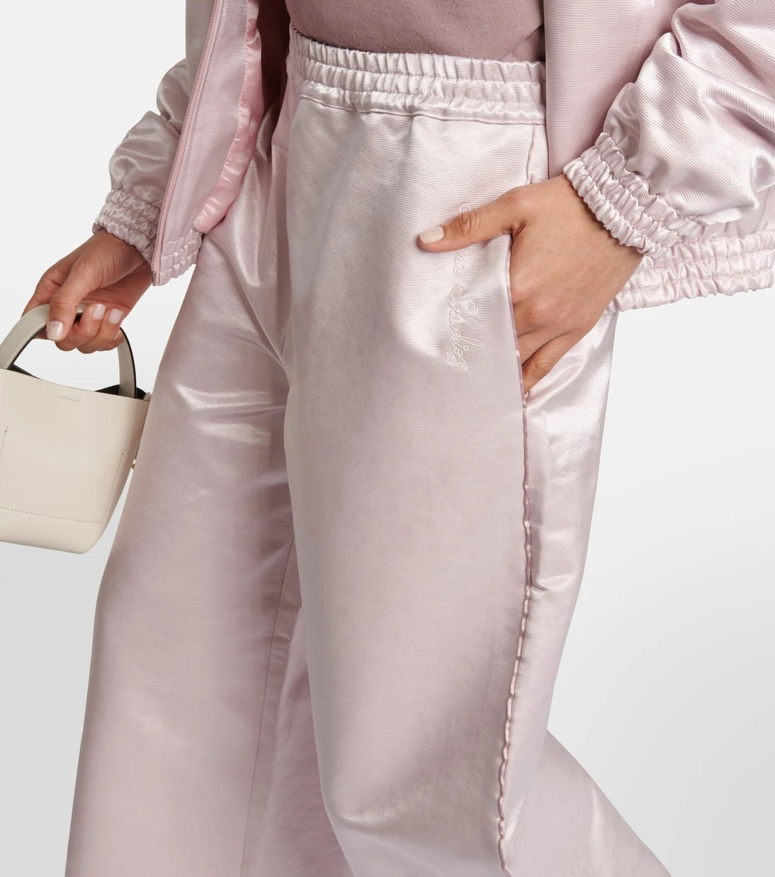 Acne Studios - بنطلون ساتان واسع الساقين
