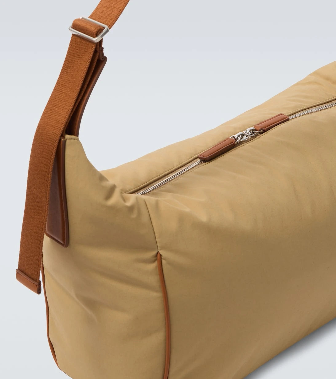 The Row - Logan E/W leather-trimmed crossbody bag