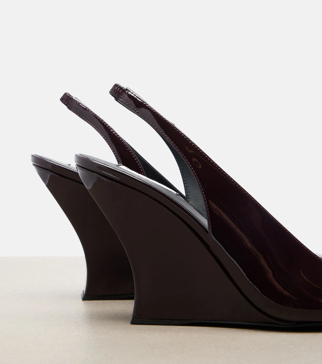 Alaïa - Patent leather wedge slingback pumps