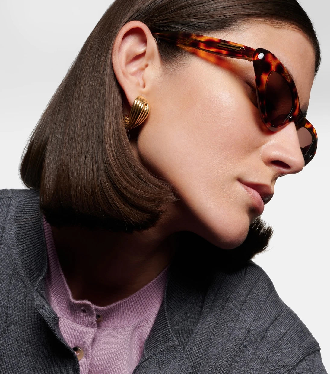 Bottega Veneta - نظارات شمسية عيون القطط المنحنية