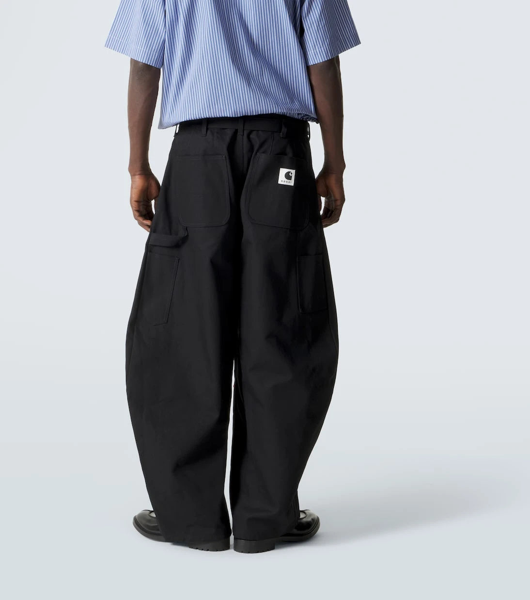 Sacai - بنطال قطني واسع الساقين من Carhartt WIP