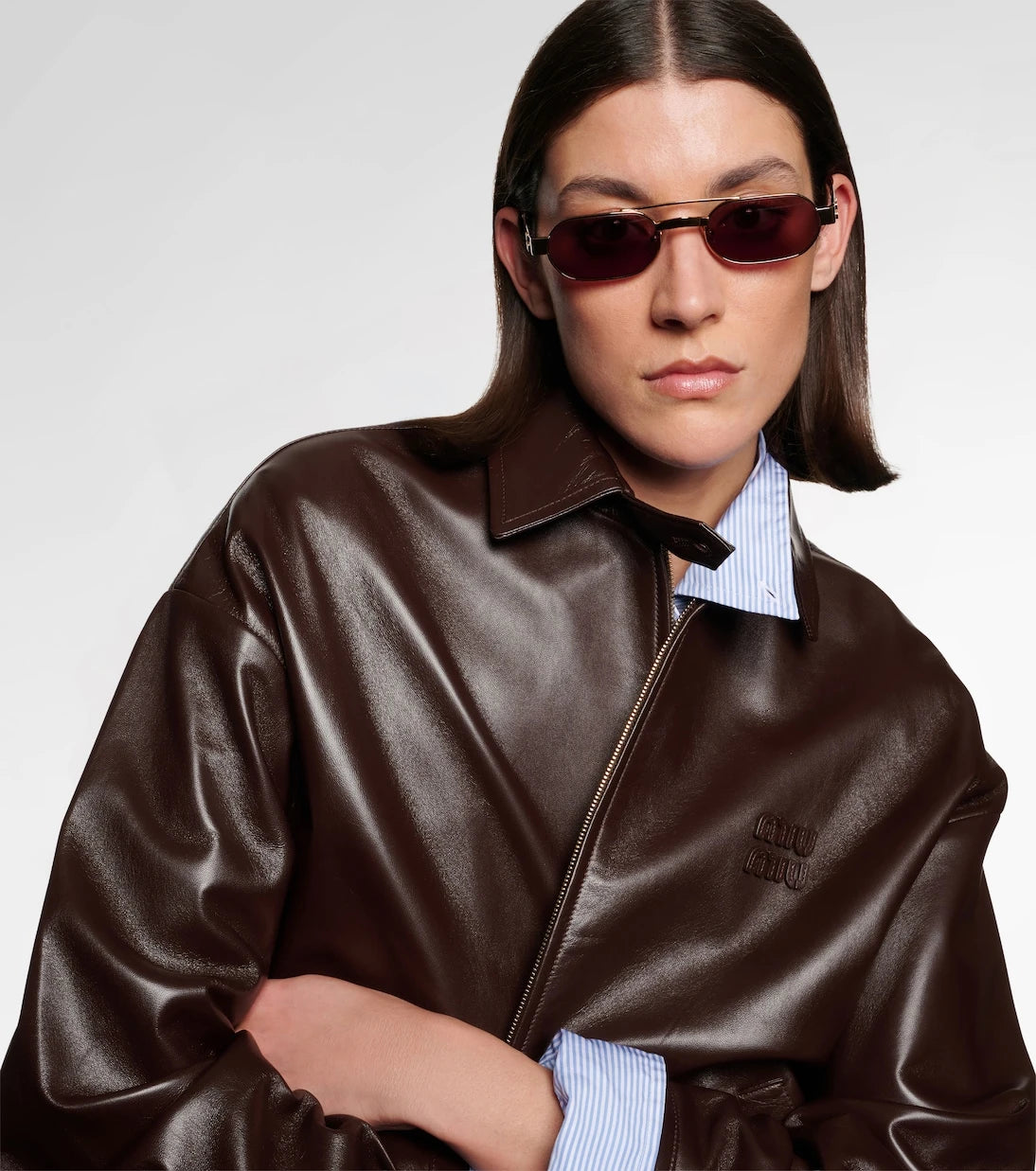 Miu Miu - نظارات شمسية بيضاوية بشعار