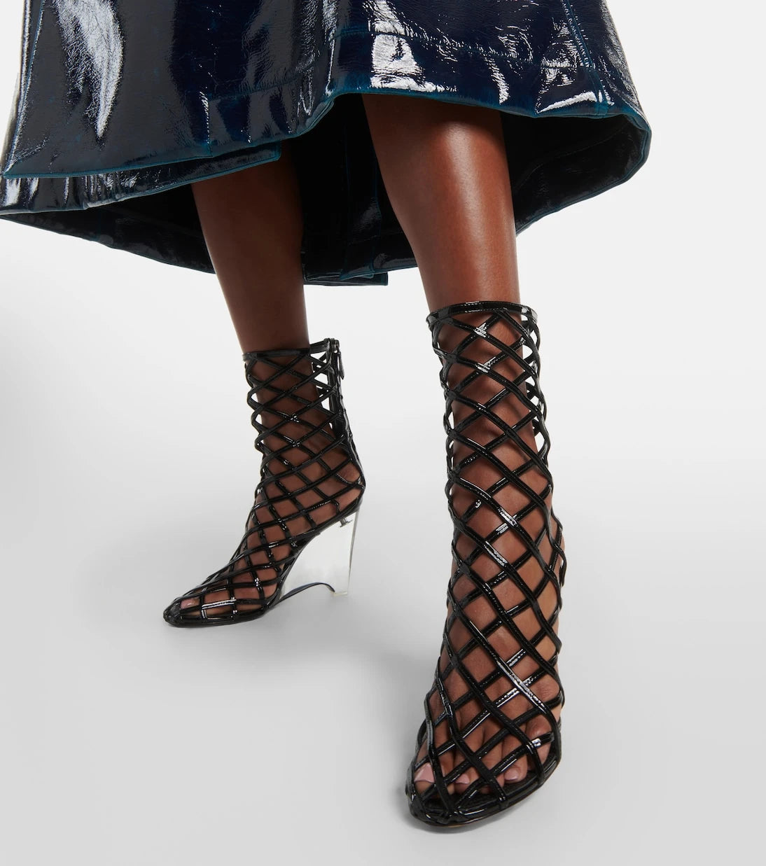 Alaïa - Leather wedge ankle boots