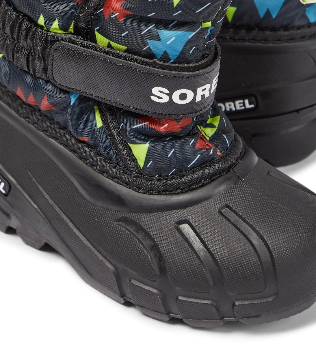 Sorel Kids - أحذية فلوري الثلجية المطبوعة