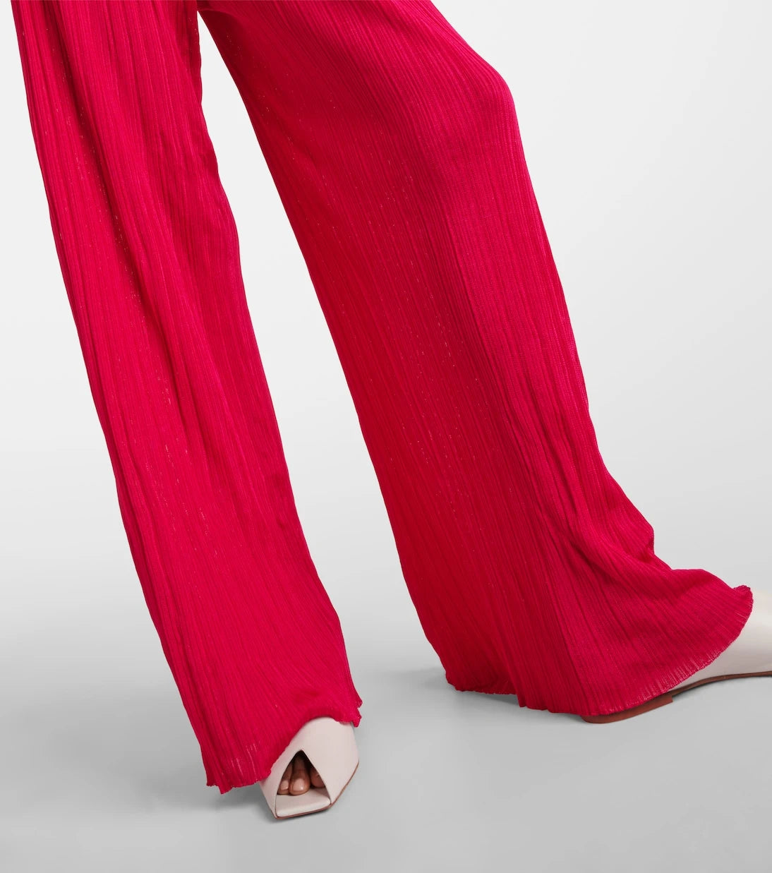 Alaïa - Strapless pleated knitted jumpsuit
