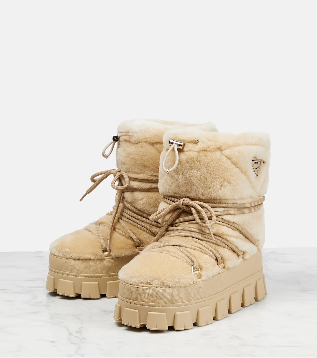 Prada - Shearling and leather snow boots
