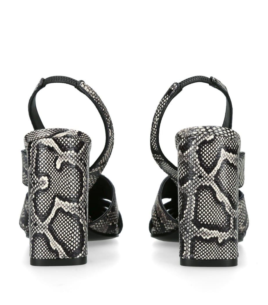 Alaïa White Snakeskin Slingback Pumps 90