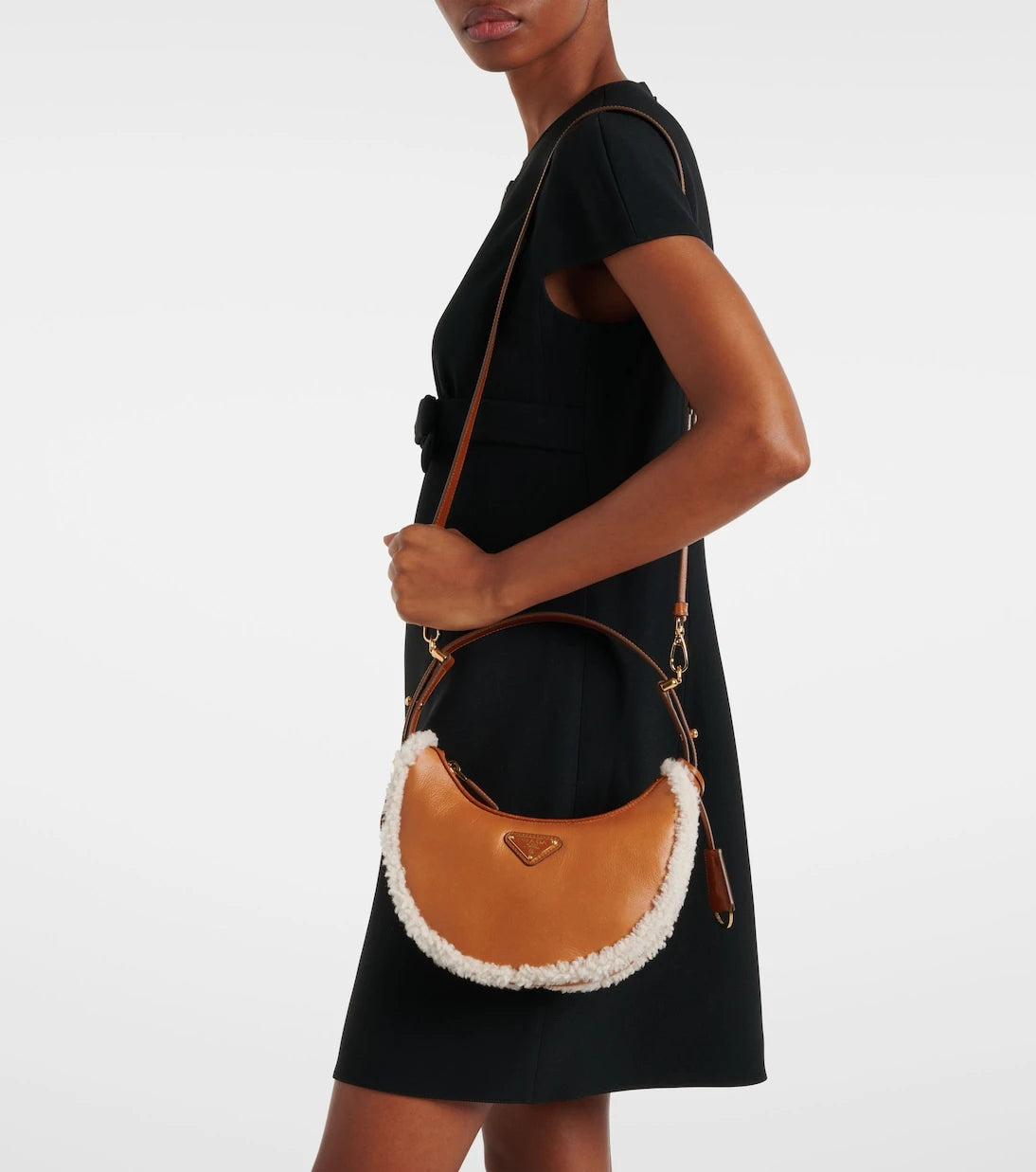 Prada - Arqué Small shearling-trimmed leather shoulder bag