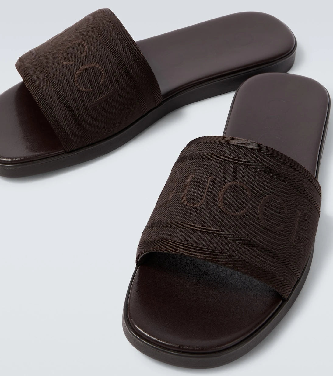 Gucci - Logo canvas and leather slides