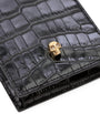 McQueen Skull-embellished croc-embossed leather phone case