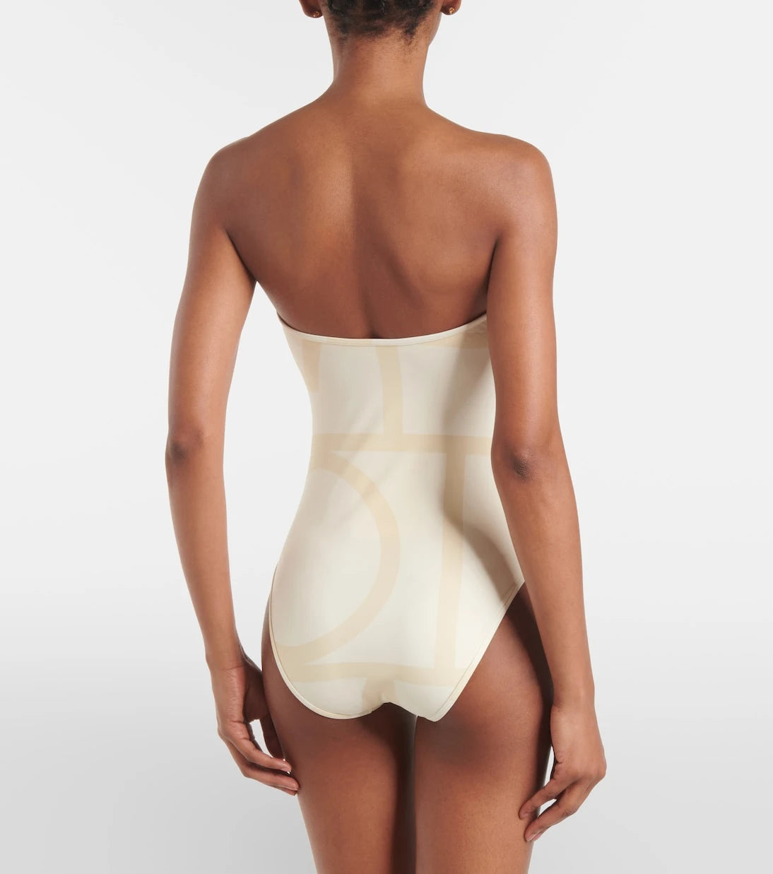 Toteme - Monogram strapless jersey swimsuit