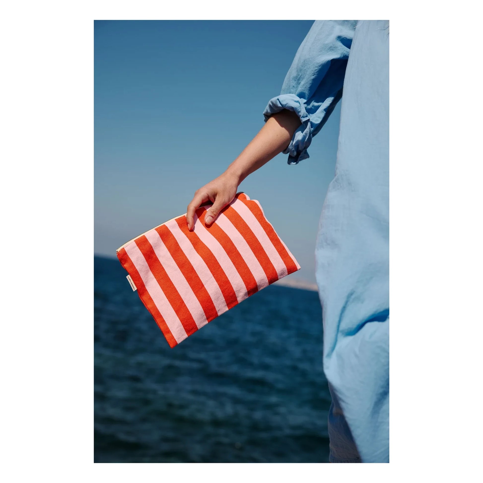 Rose in April - Lili striped clutch bag | Red