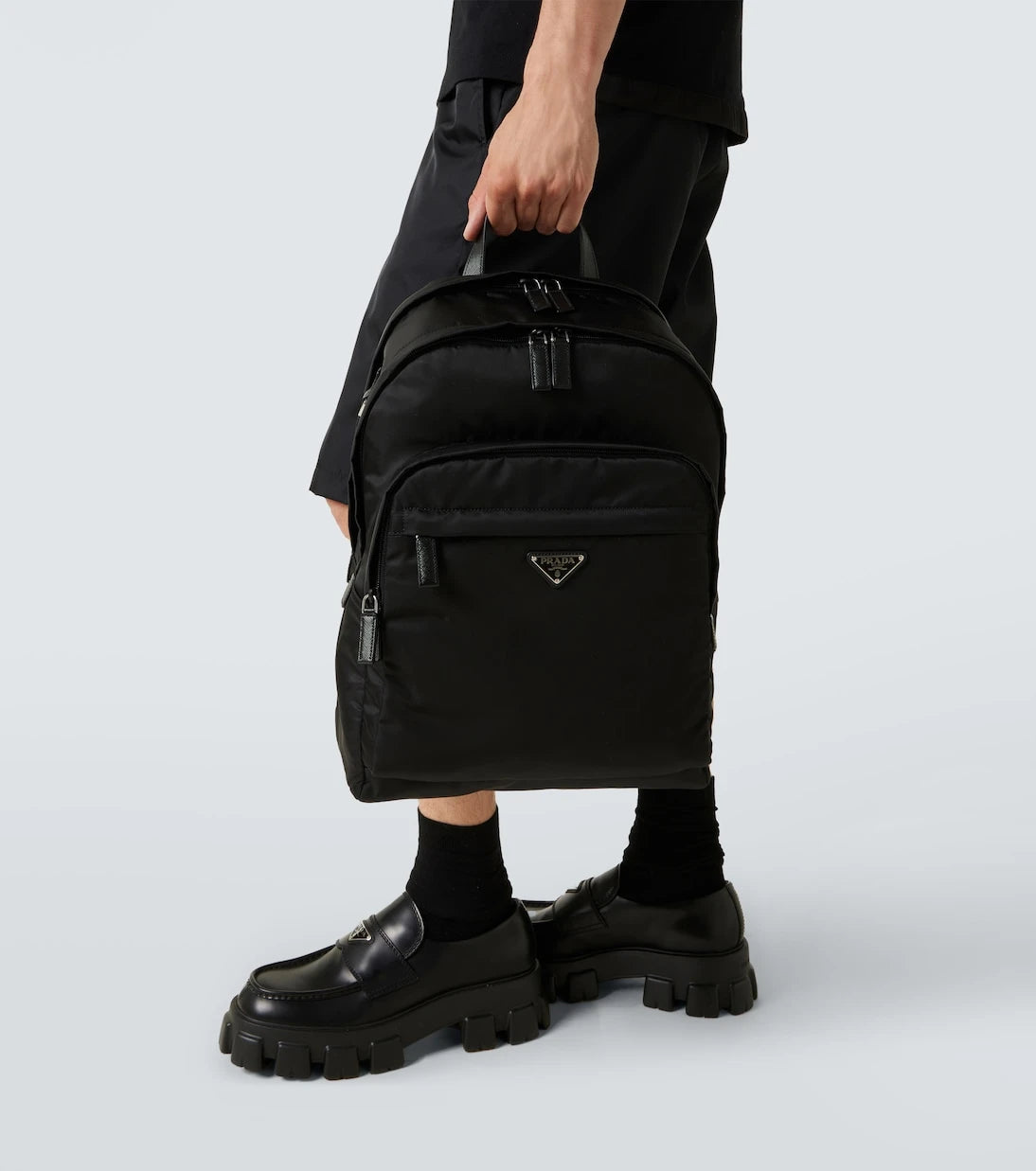 Prada - حقيبة ظهر Re-Nylon بحواف جلدية