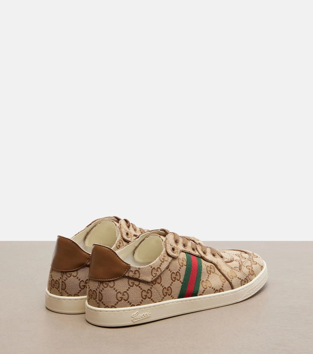 Gucci - حذاء سنيكرز منخفض الكاحل من قماش GG المطاطي