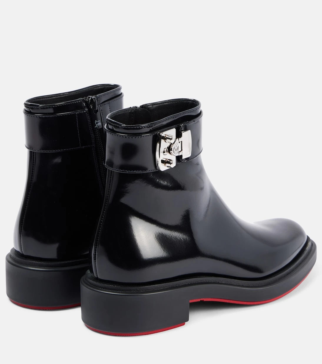 Christian Louboutin - حذاء الكاحل Urban Booty Lock من الجلد المصقول