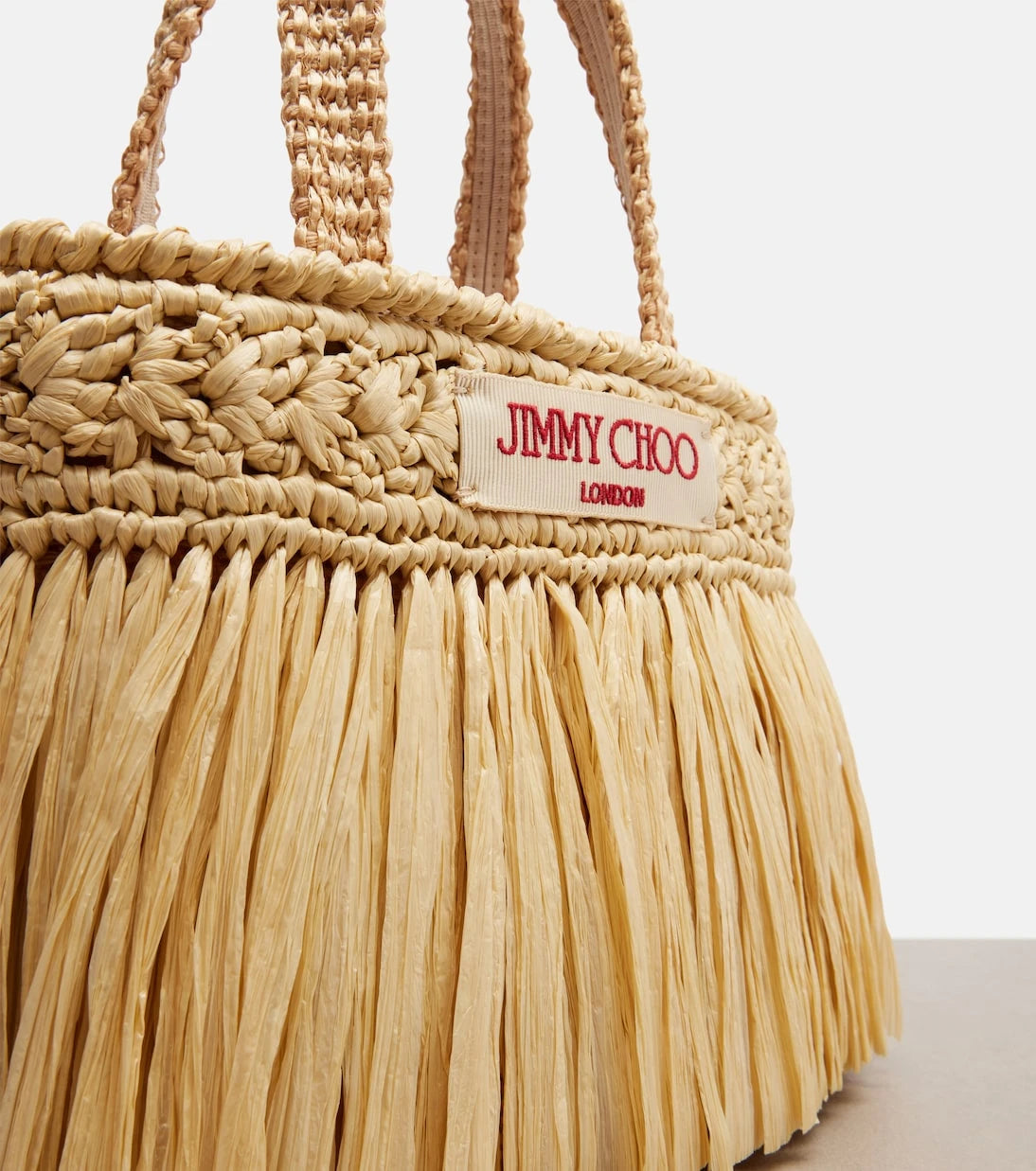 Jimmy Choo - Mini fringed raffia top-handle bag