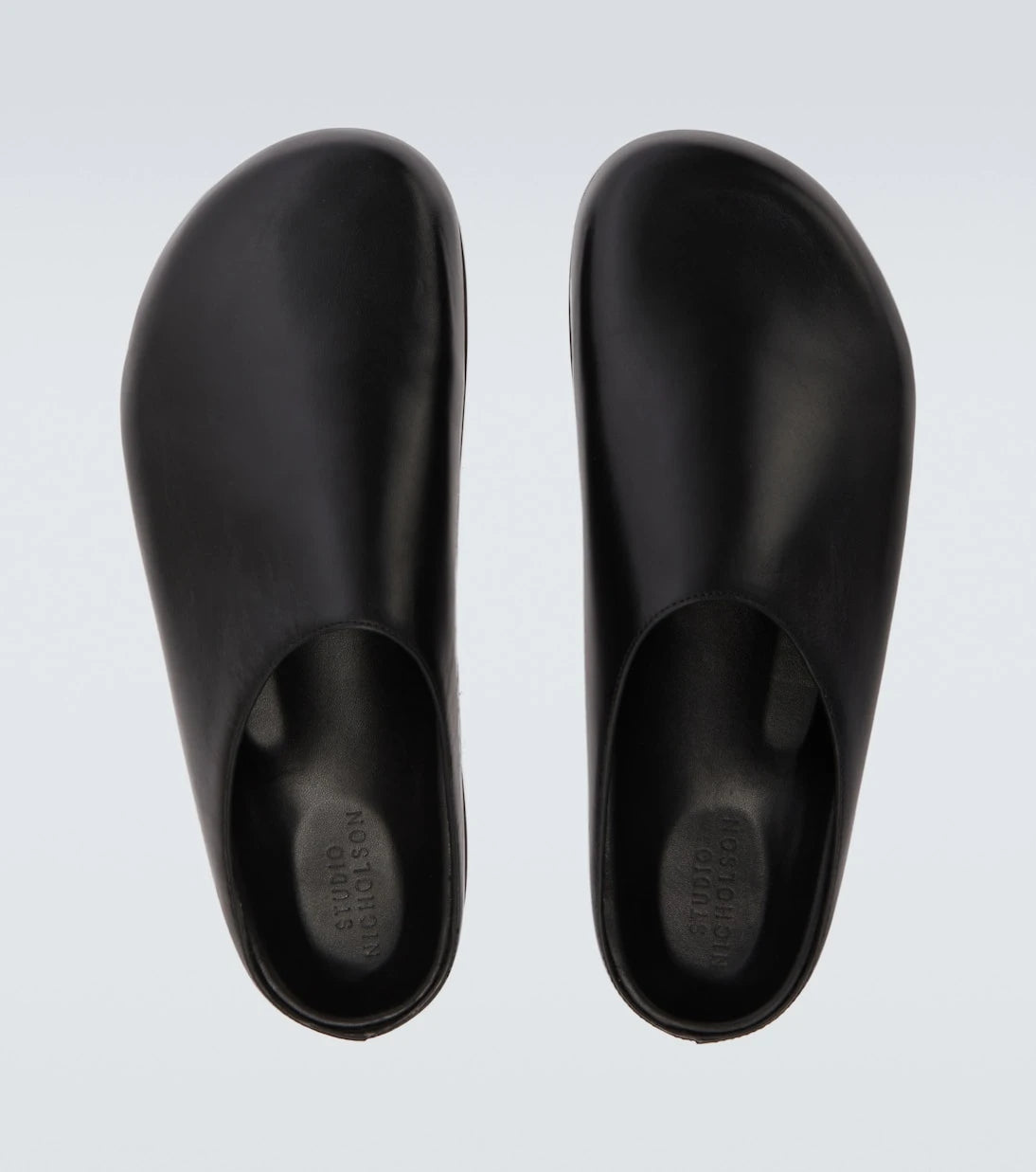 Studio Nicholson - Wearing leather mules