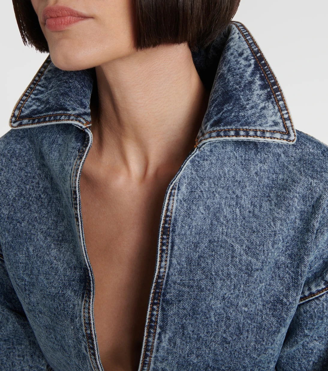 Alaïa - Asymmetric cropped denim jacket
