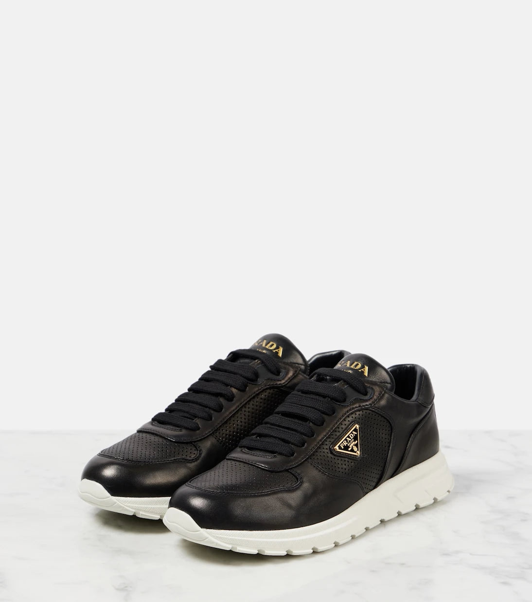 Prada - Logo leather sneakers