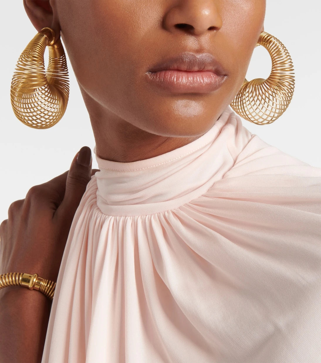Alaïa - Spiral hoop earrings