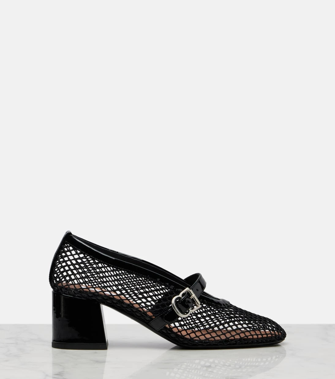 Alaïa - Fishnet leather-trimmed Mary Jane pumps