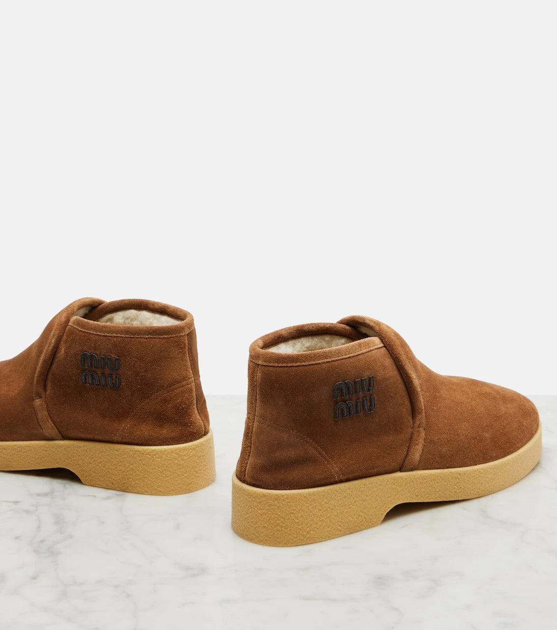 Miu Miu - Shearling-lined suede boots