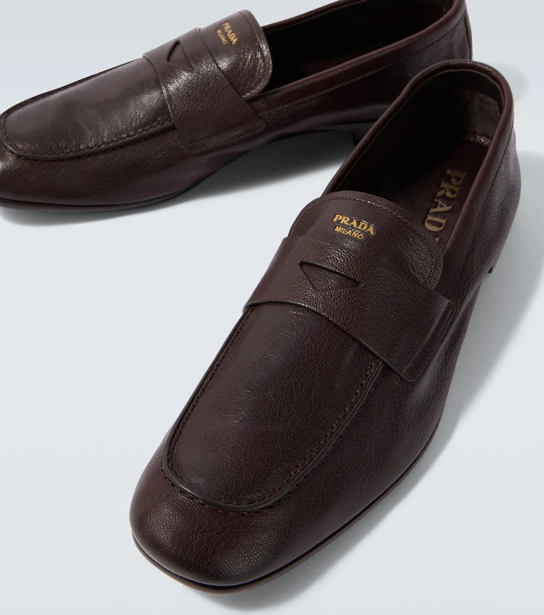 Prada - Logo leather penny loafers