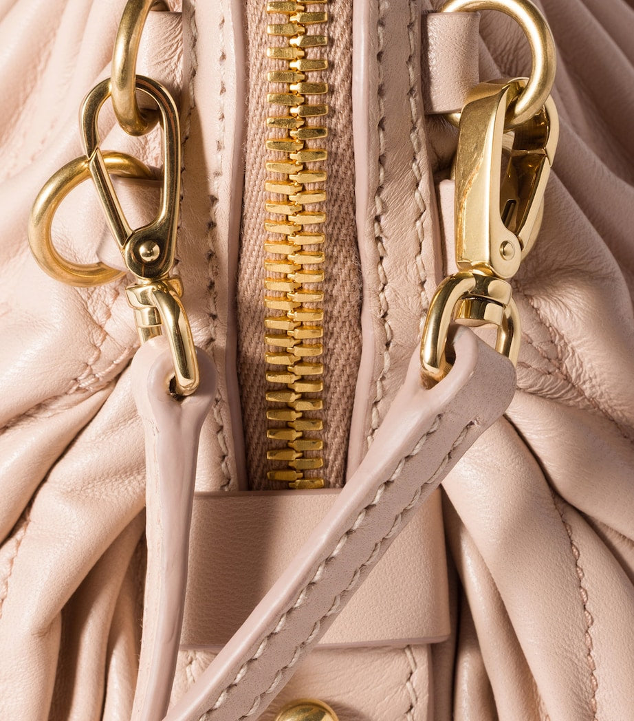 Matelassé Leather Clutch Bag