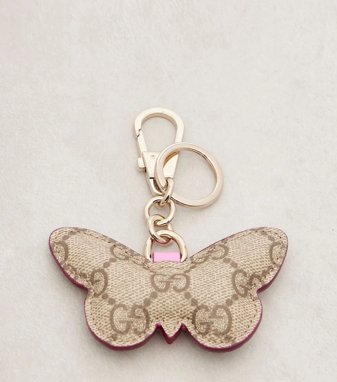 Gucci - GG leather-trimmed coated canvas bag charm