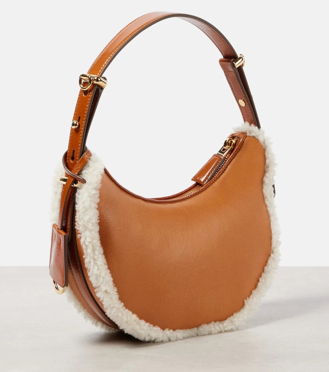 Prada - Arqué Small shearling-trimmed leather shoulder bag