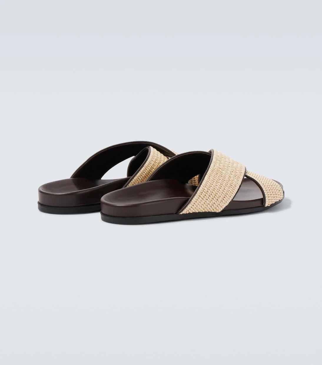 Manolo Blahnik - Chiltern leather-trimmed raffia slides
