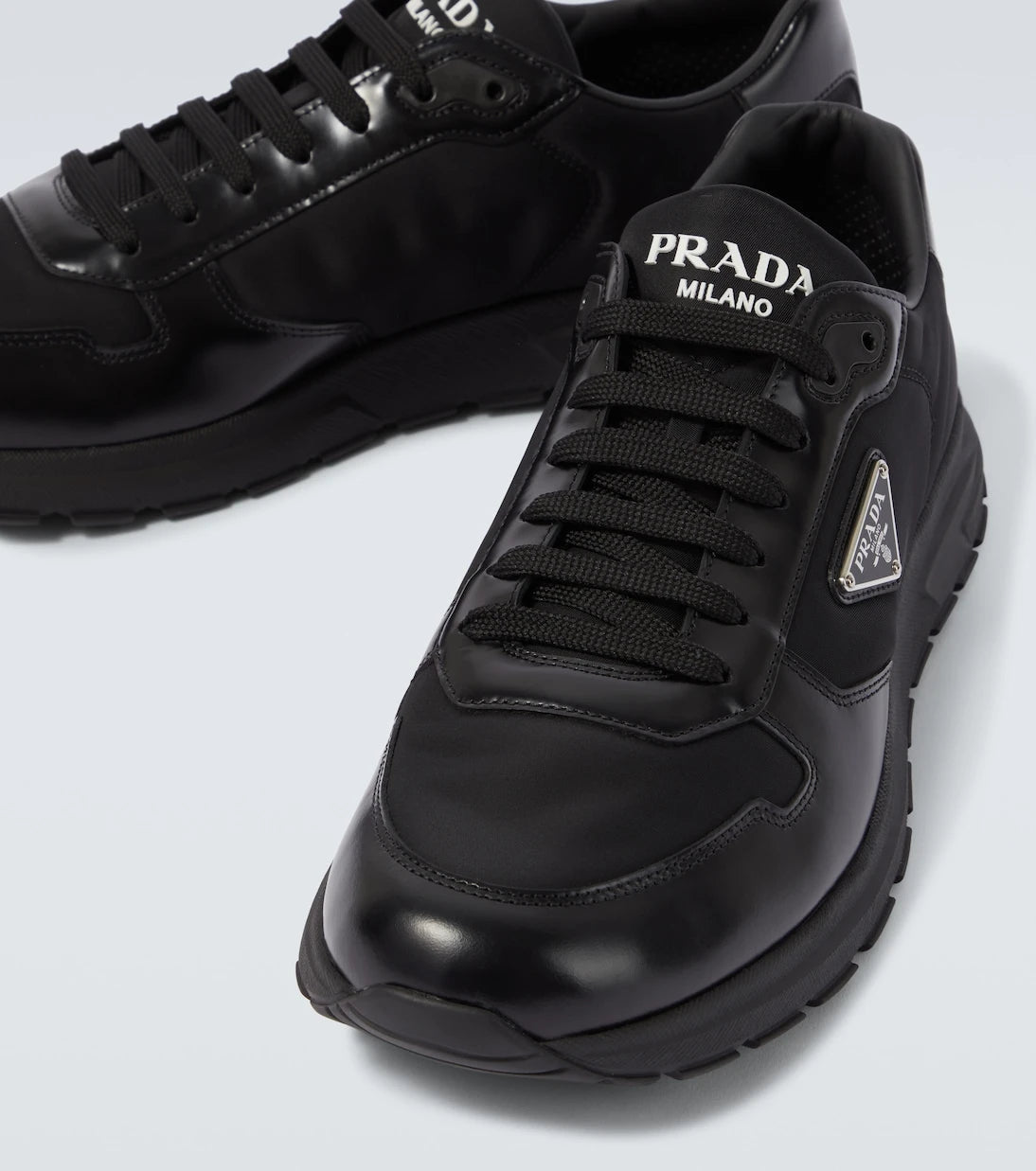 Prada - Logo leather-trimmed sneakers