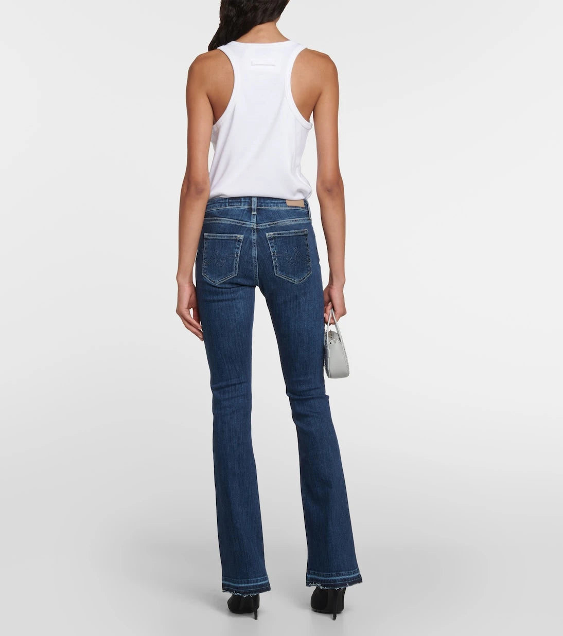 AG Jeans - بنطلون جينز بقصة ضيقة وخصر منخفض