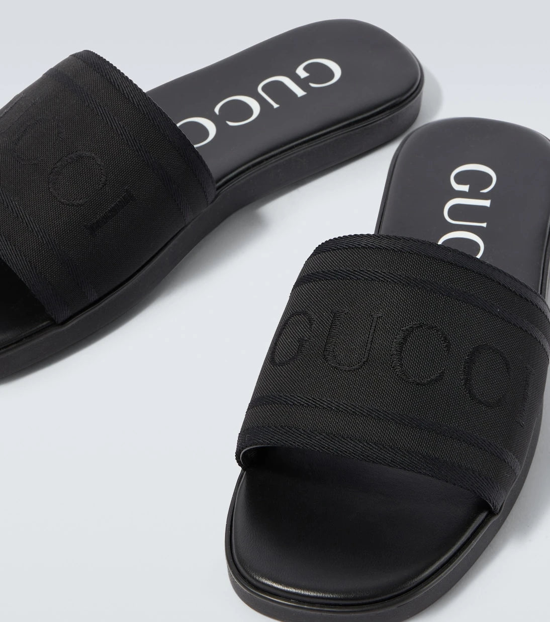 Gucci - Logo canvas and leather slides