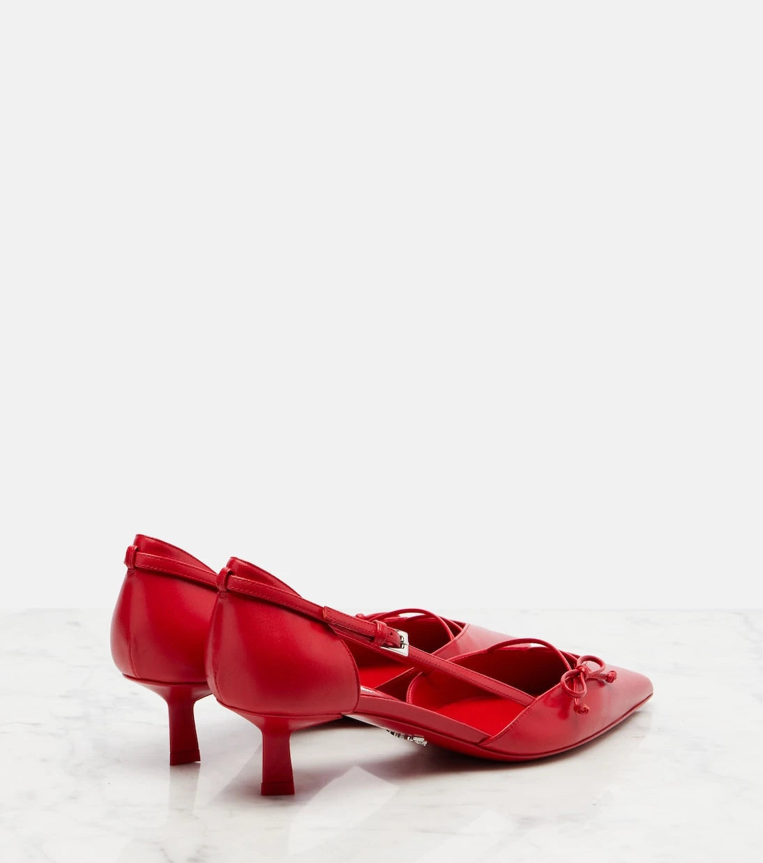 Prada - Bow-detail leather pumps