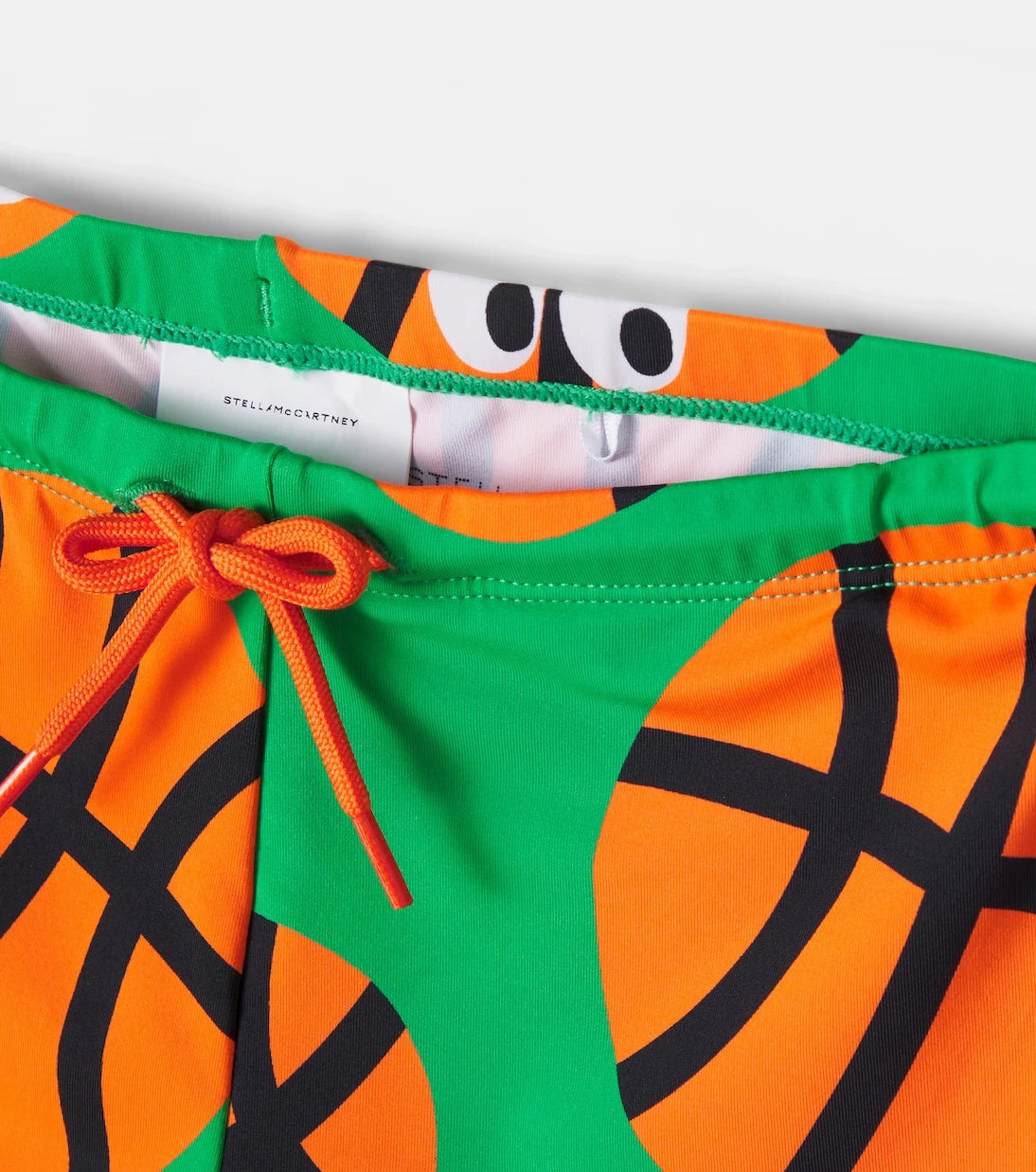 Stella McCartney Kids - Basketballs printed swim trunks