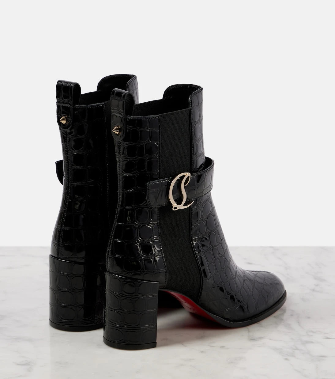 Christian Louboutin - حذاء الكاحل CL الجلدي بنمط جلد التمساح