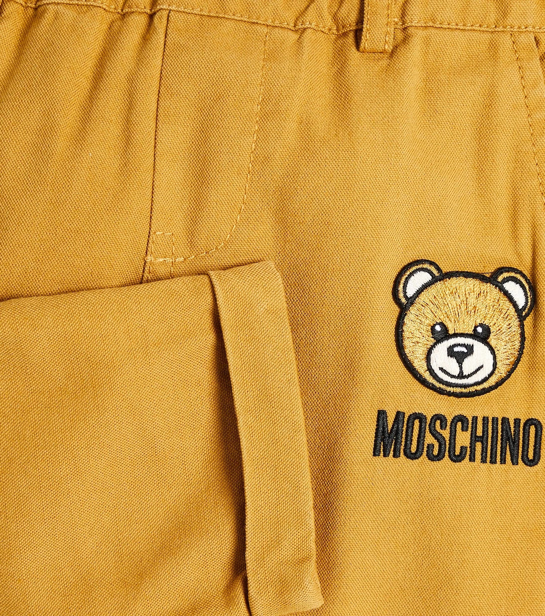 Moschino Kids - بنطلون مزيج القطن والكتان بطبعة الدب تيدي