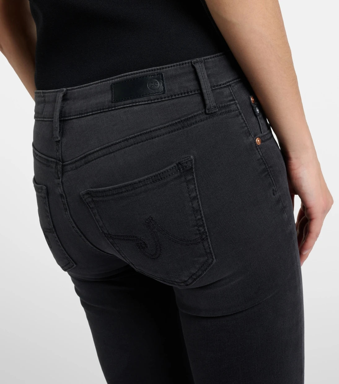 AG Jeans - بنطلون جينز سكيني بقصة منخفضة الخصر