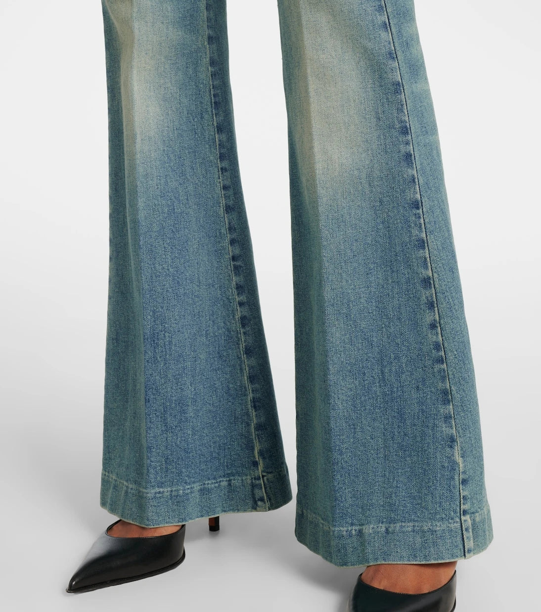McQueen - Faded flared jeans
