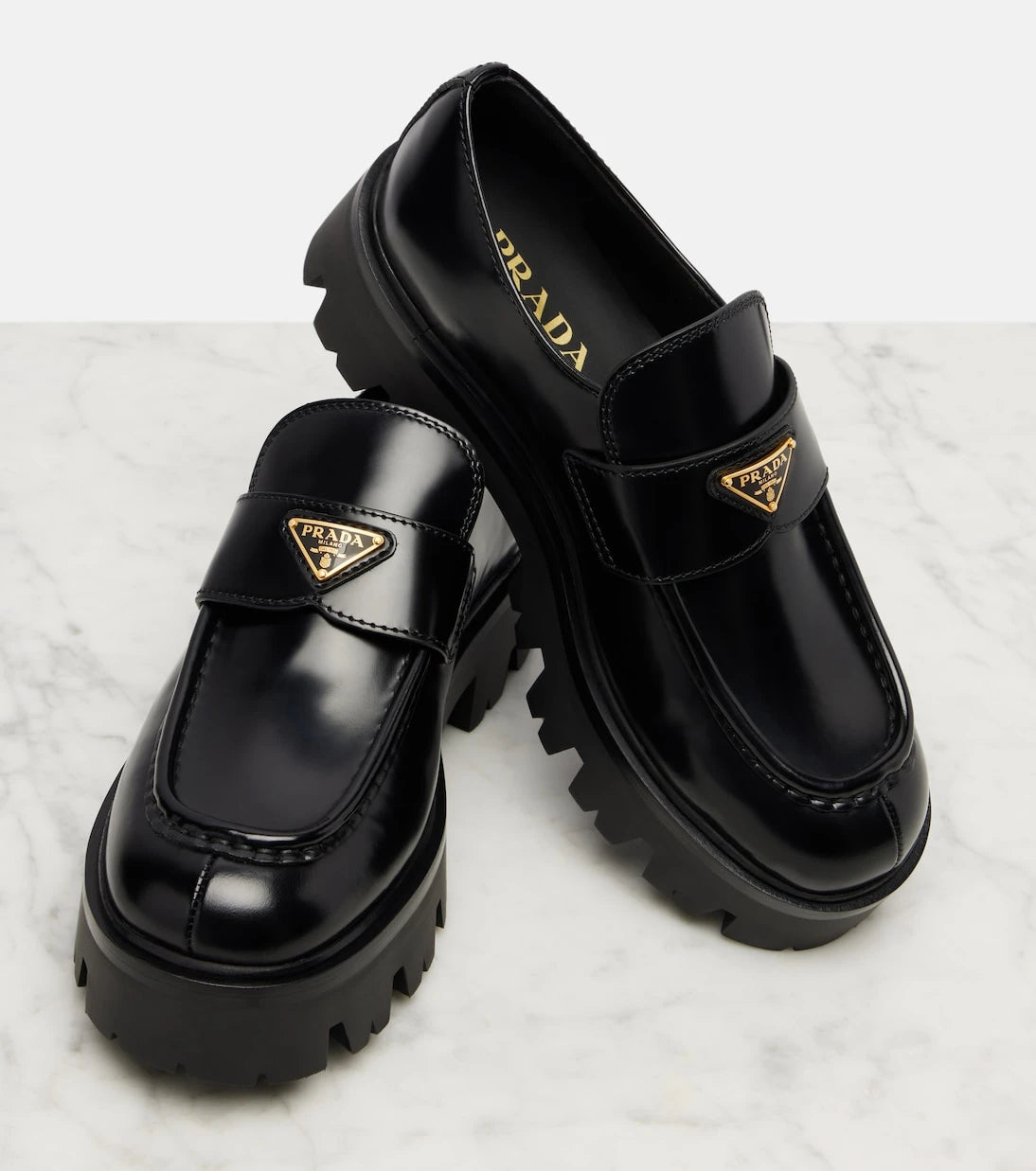 Prada - Logo leather platform loafers